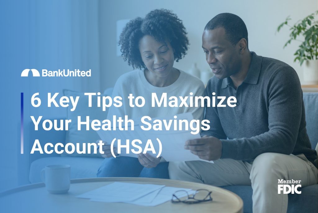 Couple looking over paperwork in living room
