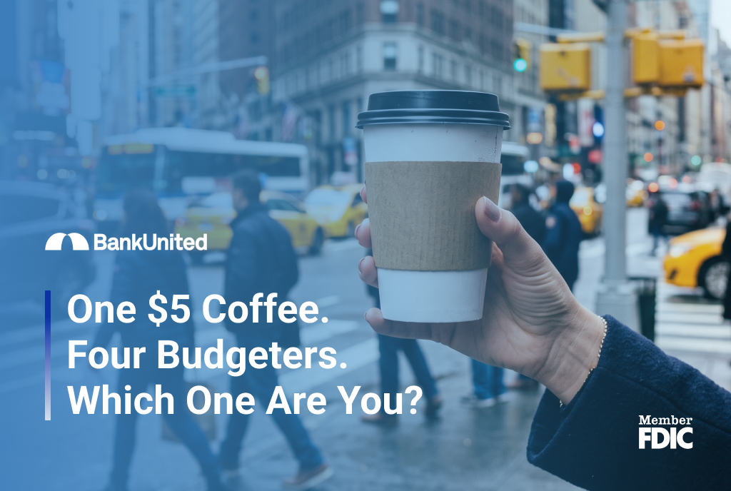 Hand holding coffee cup standing on street