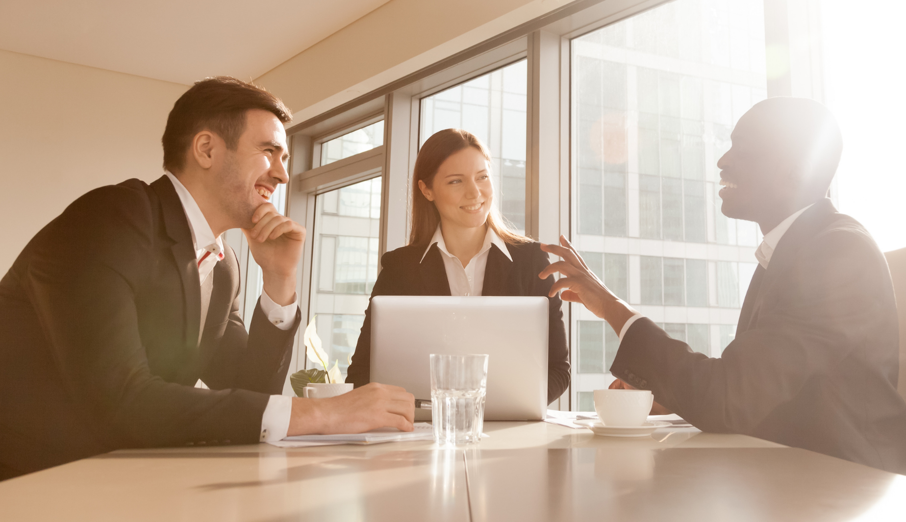 business people talking around a table