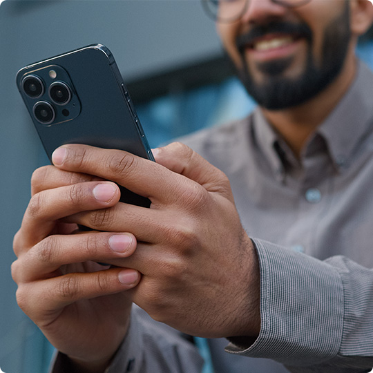 man holding cell phone