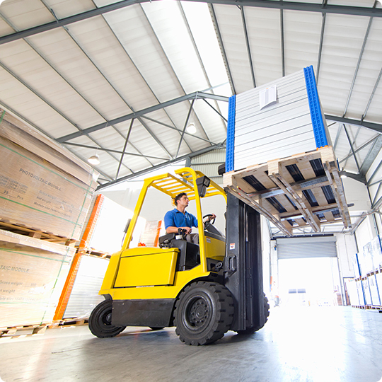 Forklift carrying pallets
