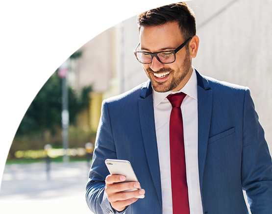 Man smiling on cell phone