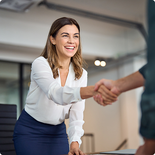 Business woman shaking hands