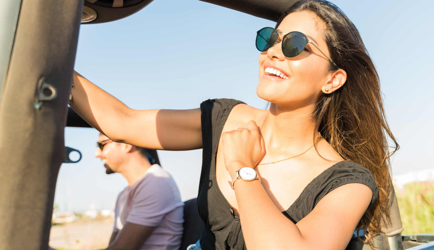 Lady with sunglasses smiling
