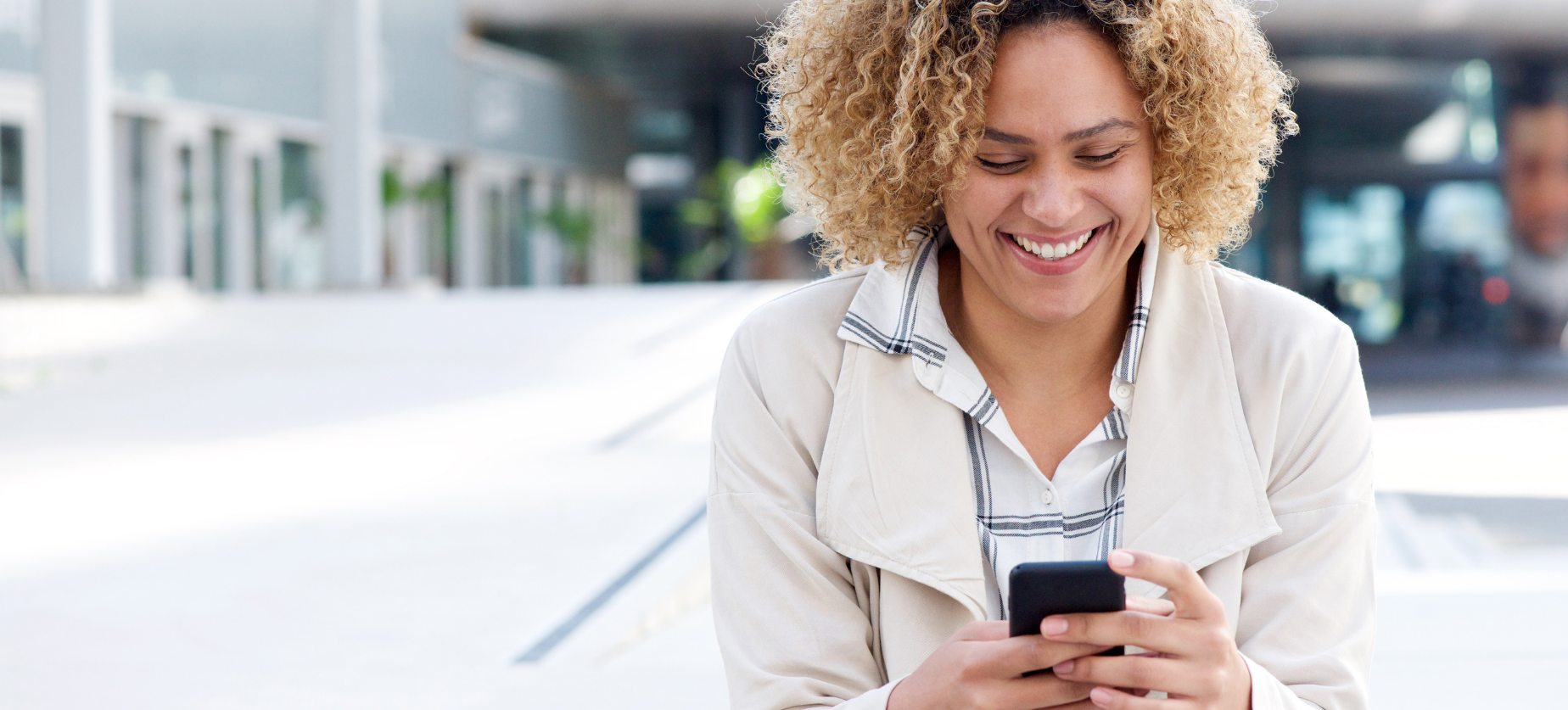 lady looking at texts on her phone