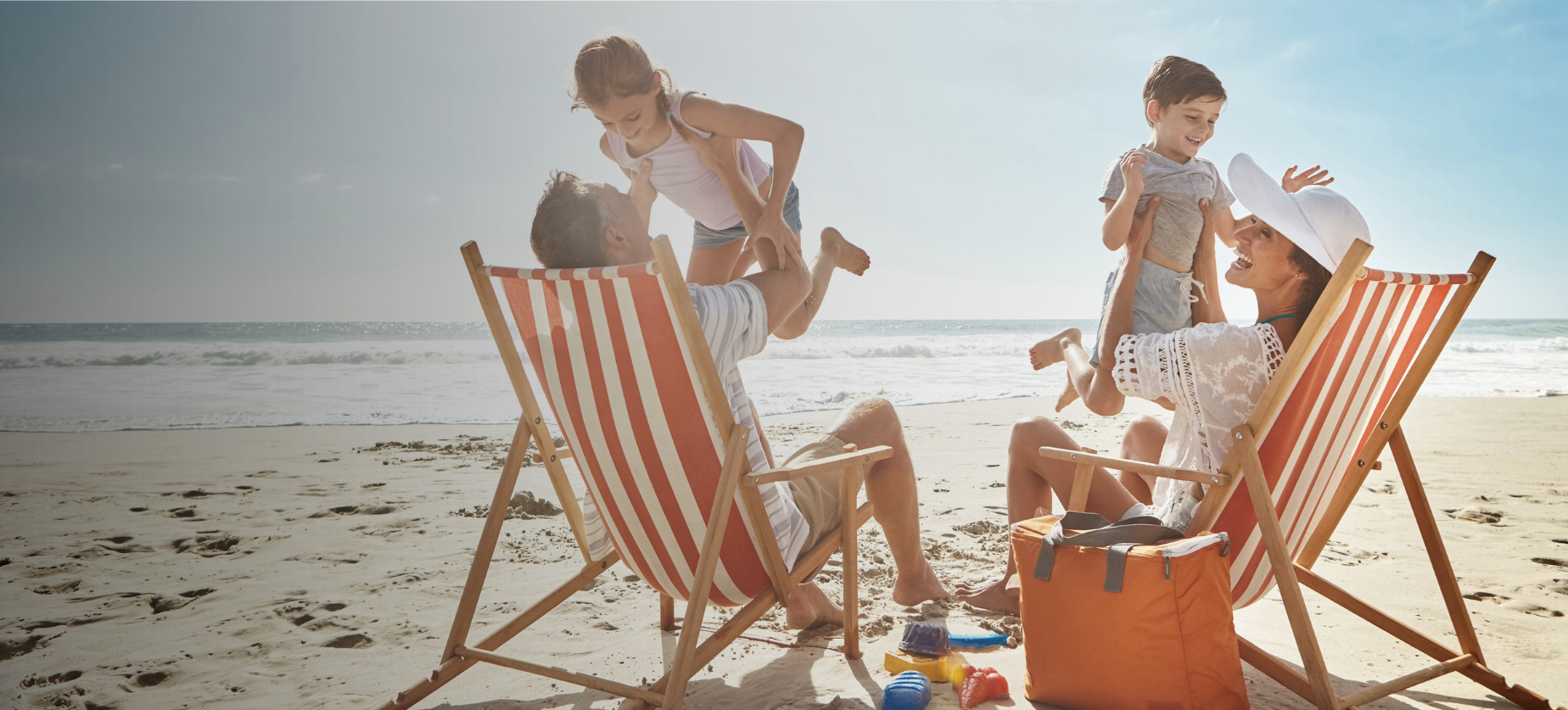 Family playing on beach
