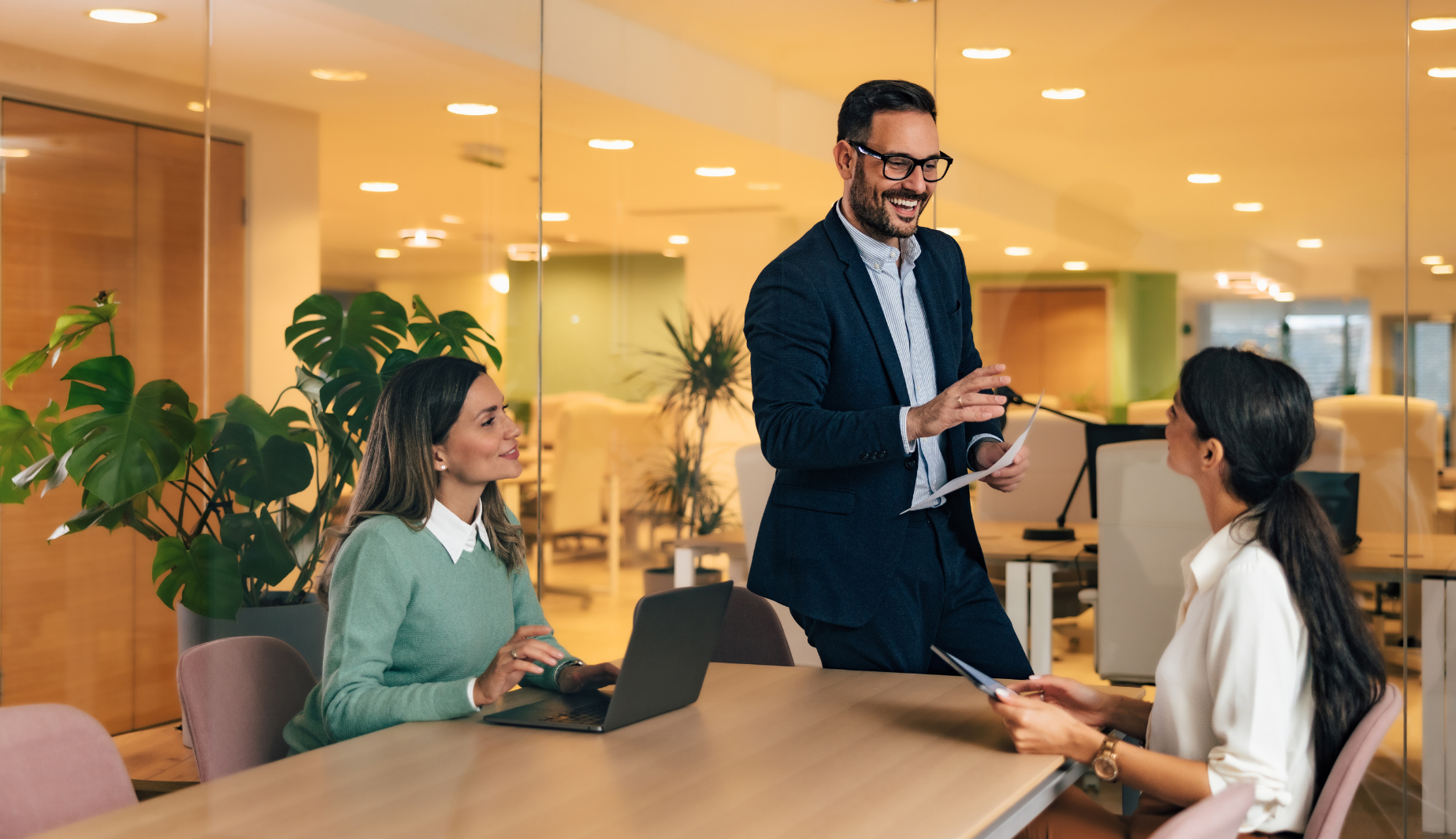 Man speaking with woman coworker