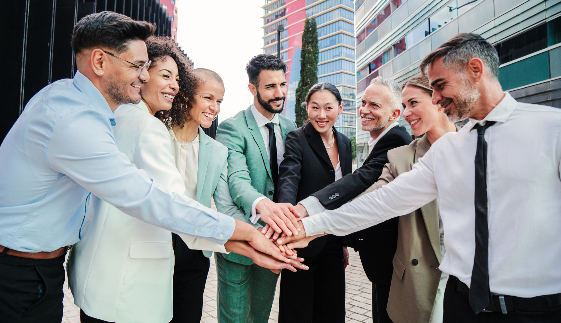 business people joining hands