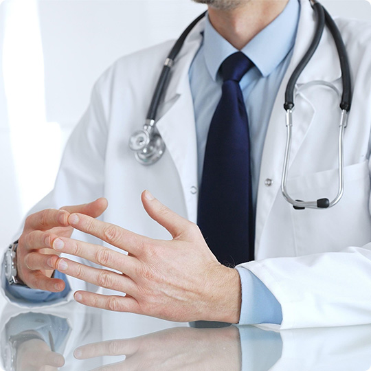 doctor touching fingertips