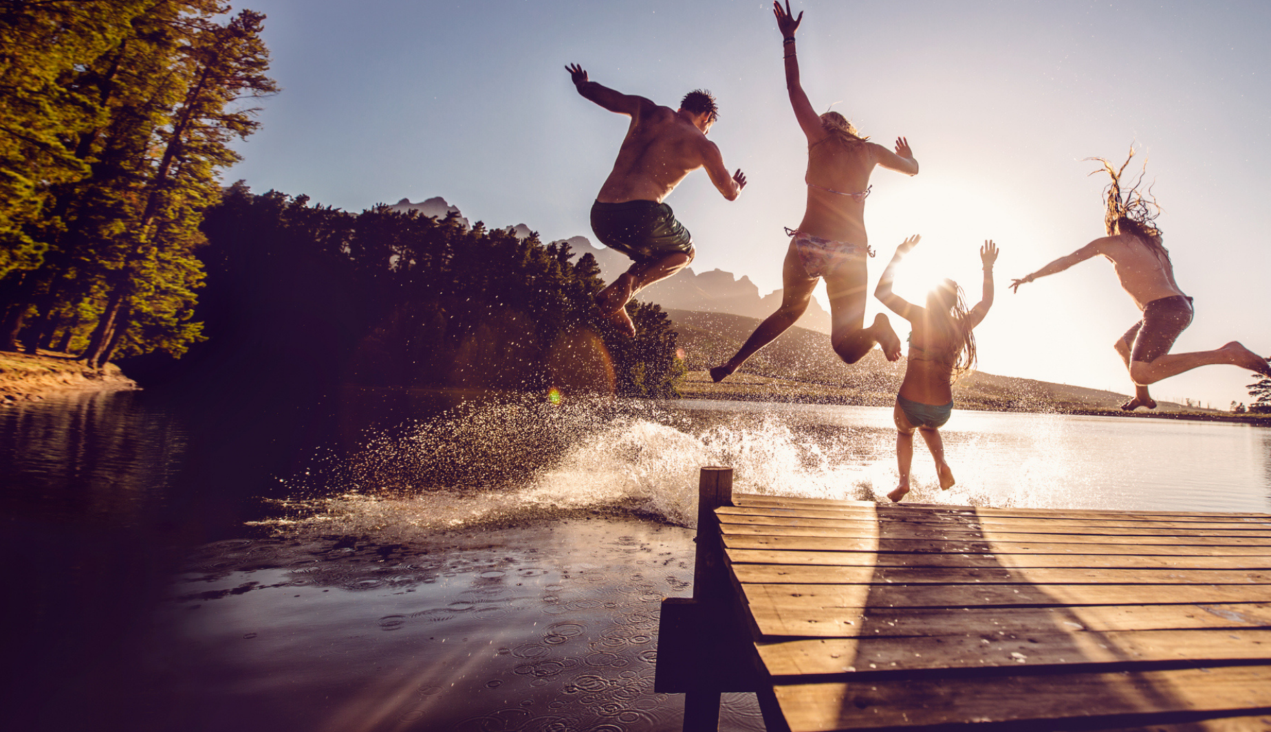People jumping into water
