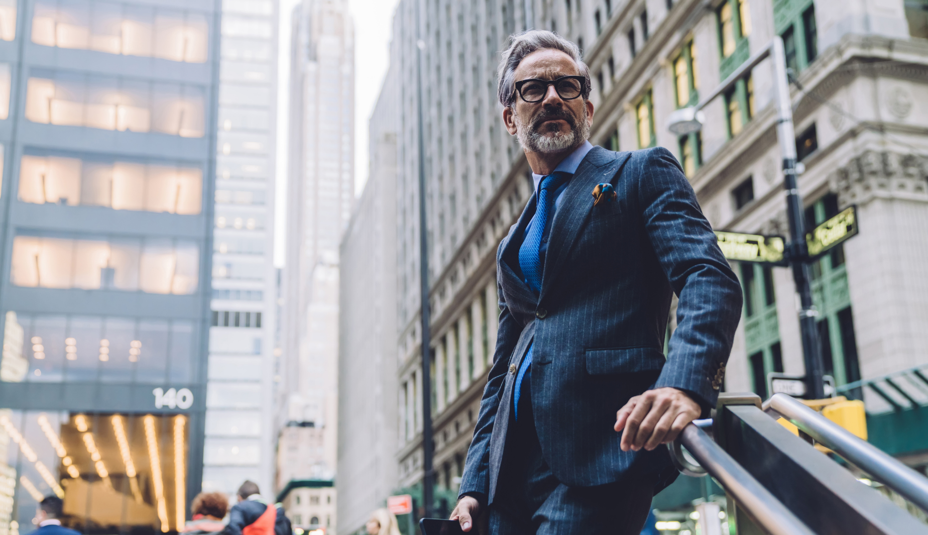 businessman standing near stairs in New York