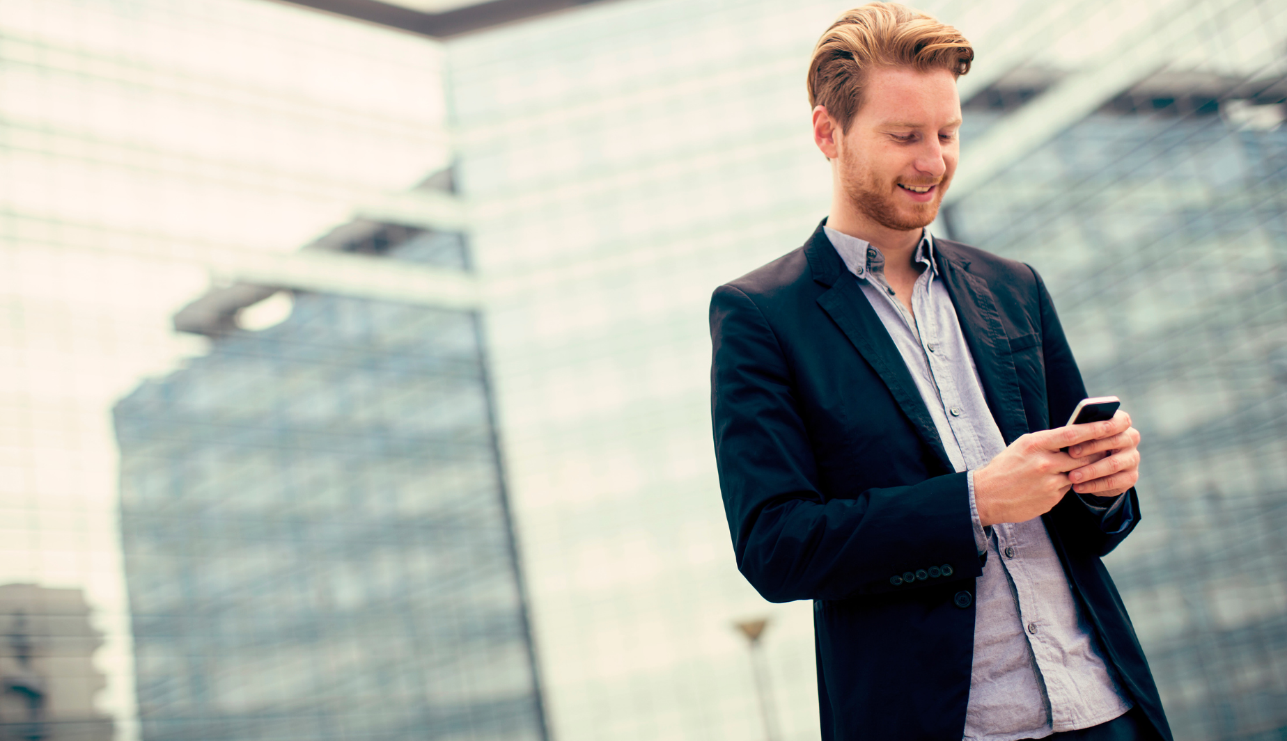 man checking app on phone