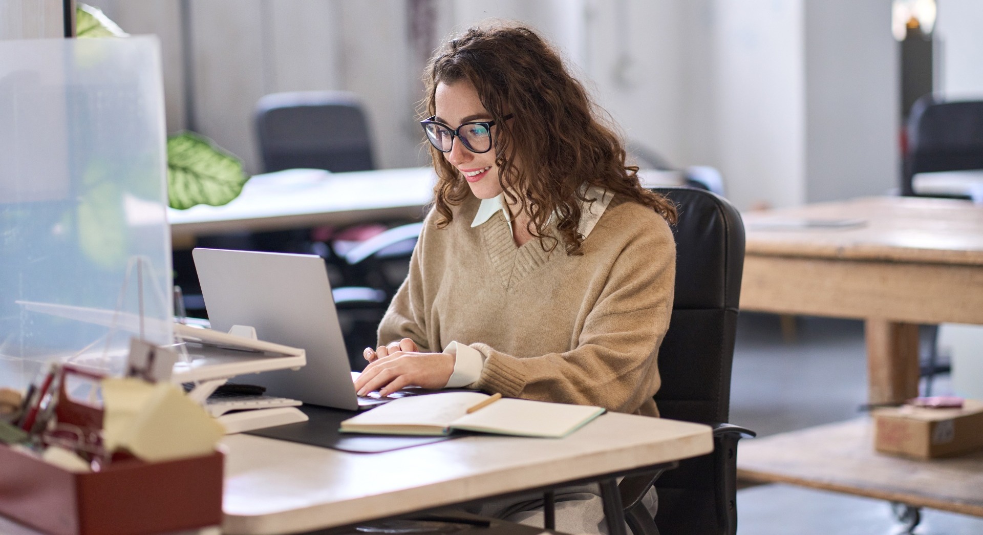 young professional woman working on laptop
