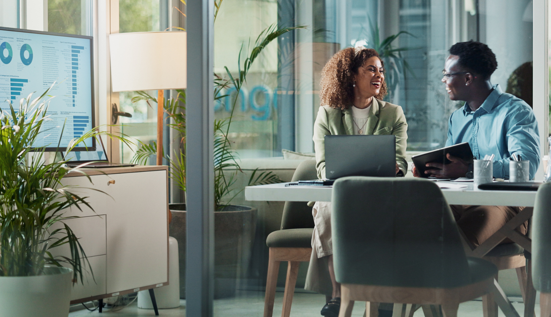 People happy discussing business financials